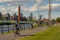 Cyclists and pedestrians along the Lachine Canal in Montreal, Canada Royalty Free Stock Photo