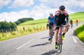 Cyclists racing on country roads