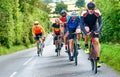 Cyclists racing on country roads Royalty Free Stock Photo