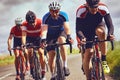 Cyclists racing on country roads