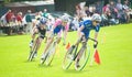 Cyclists racing at Strathpeffer. Royalty Free Stock Photo