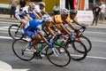 Cyclists riding abreast in the race