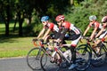 Cyclists riding bicycles on street Royalty Free Stock Photo