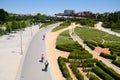 Cyclists Riding Under Puente de Toledo in Madrid Spain