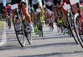 cyclists run fast on bicycles during the sports competition Royalty Free Stock Photo
