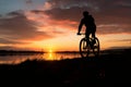 Cyclists silhouetted at dusk, embodying travel, fitness, and bicycle touring