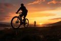 Cyclists silhouetted at dusk, embodying travel, fitness, and bicycle touring