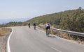 Cyclists speeding down the CC-139 winding road