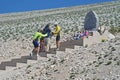 Cyclists always stop at the monument of Tommy Simpson in Mont Ventoux