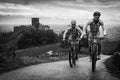 Cyclists train on the hills surrounding the castle of Soave.