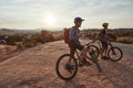 Cyclists use their sixth sense to unearth unbeaten paths. Full length shot of two men out mountain biking together