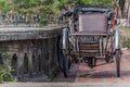 A cyclo bicycle taxi parked next to a bridge in Hue, central Vietnam