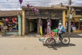 Cyclo driver is riding tourist on the street of Hoi An, Vietnam