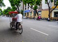 A cyclo driver is working on March 2, 2012 in Ho Chi Minh City, Vietnam. Cyclos have been around for more than a century, but they