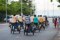 Cyclo drivers drive tourists