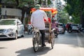 Cyclo pedicab on Hanoi street at early morning