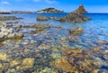 Cyclopean Isles, Aci Trezza, Sicily, Italy. These were the great stones thrown at Odysseus by the monster Cyclops in the epic poem Royalty Free Stock Photo