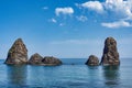 Cyclops island, basaltic rock fomation in Aci Trezza, Catania, Sicily, Italy. Royalty Free Stock Photo