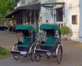 Cyclos outside Sofitel Metropole Hotel in Hanoi Royalty Free Stock Photo