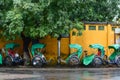 Cyclos waiting for passengers at rainy day in Hoi An, Vietnam