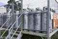 Cylinders filled with flammable LPG Liquefied Petroleum Gas, safely stored in a metal cage