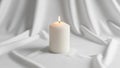 Cylindrical candle sits on a white fabric backdrop with gentle Royalty Free Stock Photo