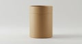 Cylindrical cardboard container with a smooth surface and a light brown color. The Royalty Free Stock Photo