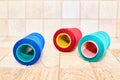 Three spools of thread. Navy, red and blue