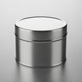 A cylindrical metal tin with a smooth, reflective surface. The tin is made of silver-color Royalty Free Stock Photo