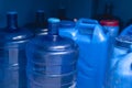Cylindrical and opaque box type HPDE water containers at a refilling station Royalty Free Stock Photo