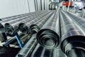 Cylindrical steel pipes. Round metal tubes in metalworking workshop Royalty Free Stock Photo