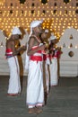 Cymbal Players or Thalampotakaruwo perform in front of the Temple of the Sacred Tooth Relic in Kandy, Sri Lanka during the Esala Royalty Free Stock Photo