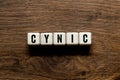 Cynic - word concept on building blocks, text Royalty Free Stock Photo