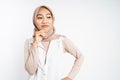 cynical asian muslim woman expression while standing over white
