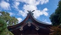 Cypress bark roof of Shikichi-jinja shrine honden decorated with chigi and katsuogi. Kyoto. Japan