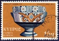 CYPRUS - CIRCA 1973: A stamp printed in Cyprus shows Archaic Bichrome Kylix cup, 7th century BC, circa 1973. Royalty Free Stock Photo