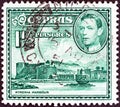 CYPRUS - CIRCA 1938: A stamp printed in Cyprus shows Kyrenia Harbor and King George VI, circa 1938.