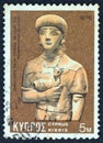 CYPRUS - CIRCA 1976: A stamp printed in Cyprus shows a terracotta from 7th century BC found in Cyprus, circa 1976.