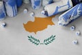 Cyprus flag and few used aerosol spray cans for graffiti painting. Street art culture concept