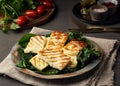 Cyprus fried halloumi cheese with healthy green salad. Lchf, pegan, fodmap, paleo, scd, keto diet