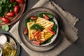 Cyprus fried halloumi cheese with healthy green salad. Lchf, pegan, fodmap, paleo, scd, keto diet Royalty Free Stock Photo