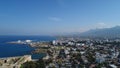 Cyprus Kyrenia Drone Footage from sky mountains city view Mediterranean sea Girne North Cyprus KKTC blue color best holiday summer