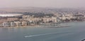 Cyprus, Larnaca aerial view. Multi-storey buildings, sandy beach, blue sea and sky