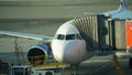 Cyprus, Larnaca - October 12, 2022:The plane is at the pull-out arm at the airport. Preparing a flight: airplane with passenger Royalty Free Stock Photo