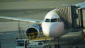 Cyprus, Larnaca - October 12, 2022:The plane is at the pull-out arm at the airport. Preparing a flight: airplane with passenger Royalty Free Stock Photo