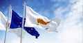 Cyprus national flag waving with the European Union flag on a clear day