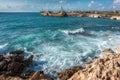 Cyprus, Paphos. Shipwreck. The ship crashed on the coastal rocks. Rusty ship at the shore of the Mediterranean sea. Tourist