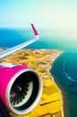 Cyprus - 18th april, 2023: wizzair low-coast budget friendly aircraft takes off from Larnaca airport fly over greek side Royalty Free Stock Photo