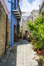 Cyprus village Lefkara. View of a village stony tiled street with lot of green and colorful walls