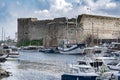 CYPRUS - WINTER, 2019: Kyrenia castle. Sea pier with boats, ships and yachts. Seascape